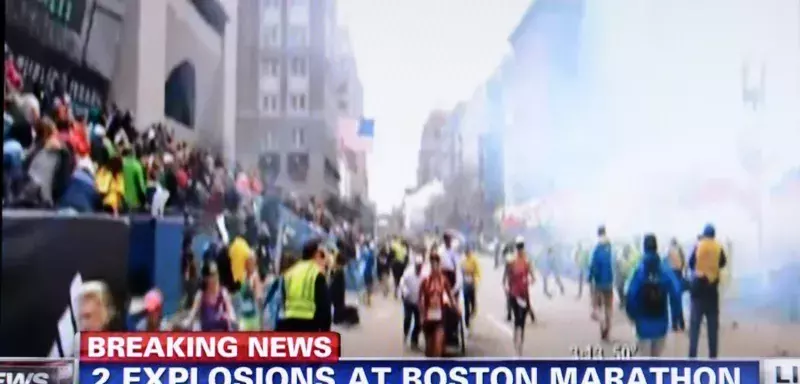 scènes d'effoi et de panique sur la ligne d'arrivée du Marathon de Boston... (Xinhua)