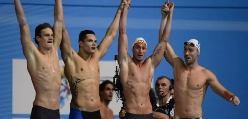 Le relais 4x100m nage libre français est devenu champion du monde à Barcelone, avec deux Marseillais dans ses rangs : Florent Manaudou et Fabien Gilot (deuxième et troisième de gauche à droite). (D R)  