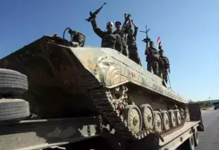 les troupes syriennes en opération à Hama (Photo: Xinhua)