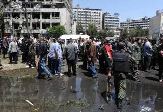 Les attentats à la voiture piégée se multiplient dans le centre de Damas... (Xinhua)