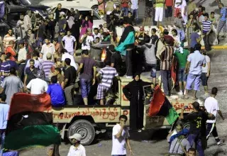 les rebelles dans le centre ville de Tripoli (Photo: Xinhua)