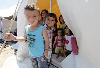 des enfants syriens réfugies accueillis dan un camp à la frontière avec la Turquie (DR)