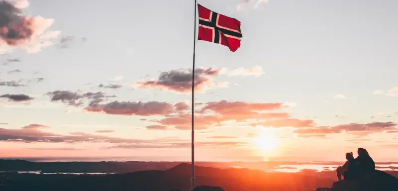 Norway flag standing on cliff