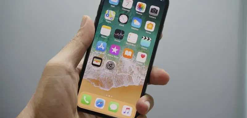 person holding space gray iPhone 7
