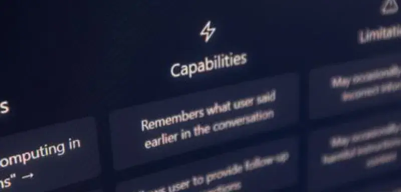 Vertical shot of ChatGPT interface on screen highlighting AI capabilities.