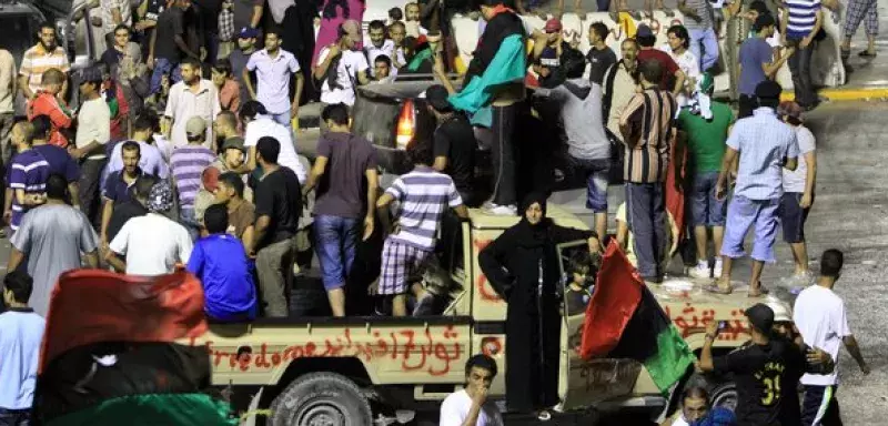 les rebelles dans le centre ville de Tripoli (Photo: Xinhua)