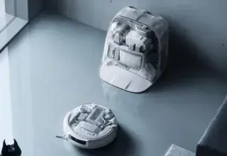 Un aspirateur robot connecté dans un salon, illustration des risques de cybersécurité liés aux objets connectés domestiques