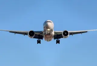 airplane in midair at daytime