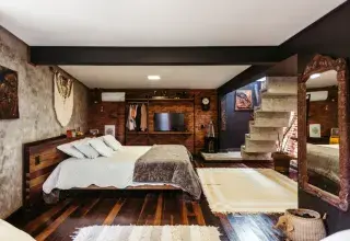 Cozy rustic modern bedroom with unique decor in Santa Teresa, Brazil.