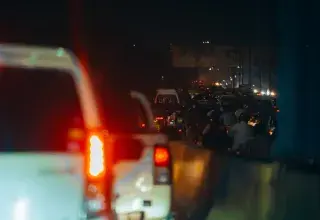 a bunch of cars that are sitting in the street