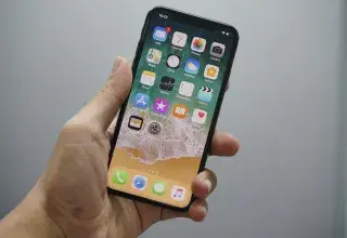 person holding space gray iPhone 7