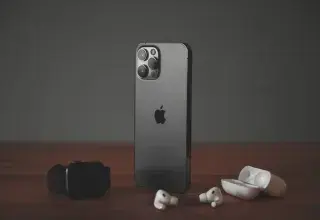 black iphone 7 with white and black dice