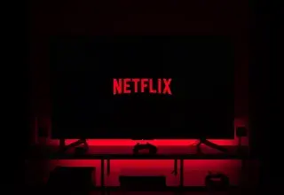 flat screen television displaying Netflix logo